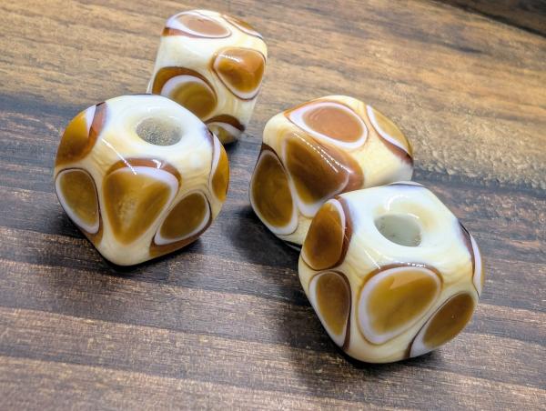 eye bead ivory amber brown