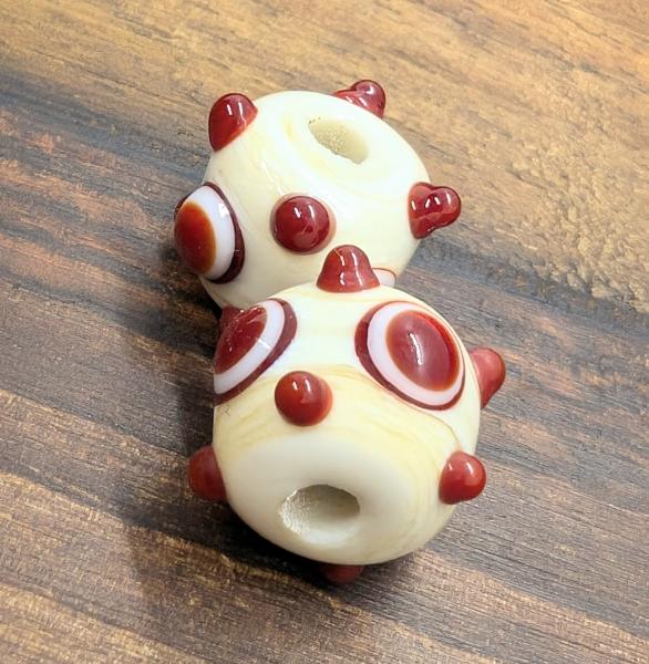 eye bead ivory red brown