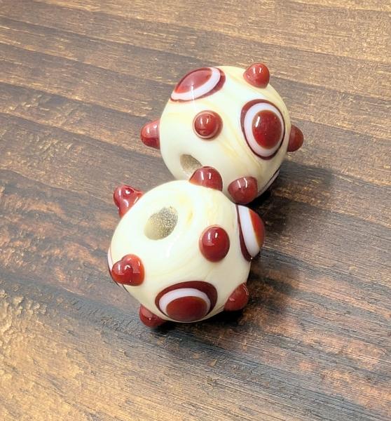 eye bead ivory red brown
