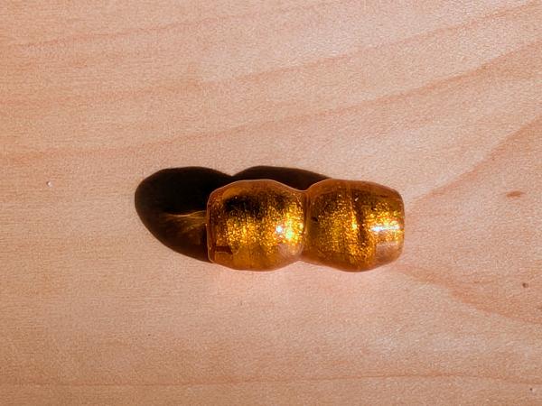 Glass pearl with gold foil topaz brown